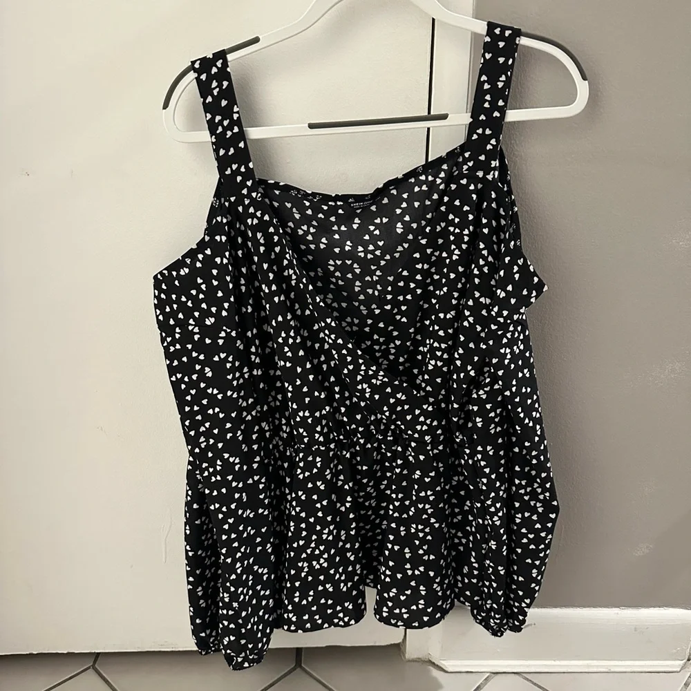 Black blouse with white hearts (shein size) - has bare shoulders and long sleeve - Picture 1 of 1